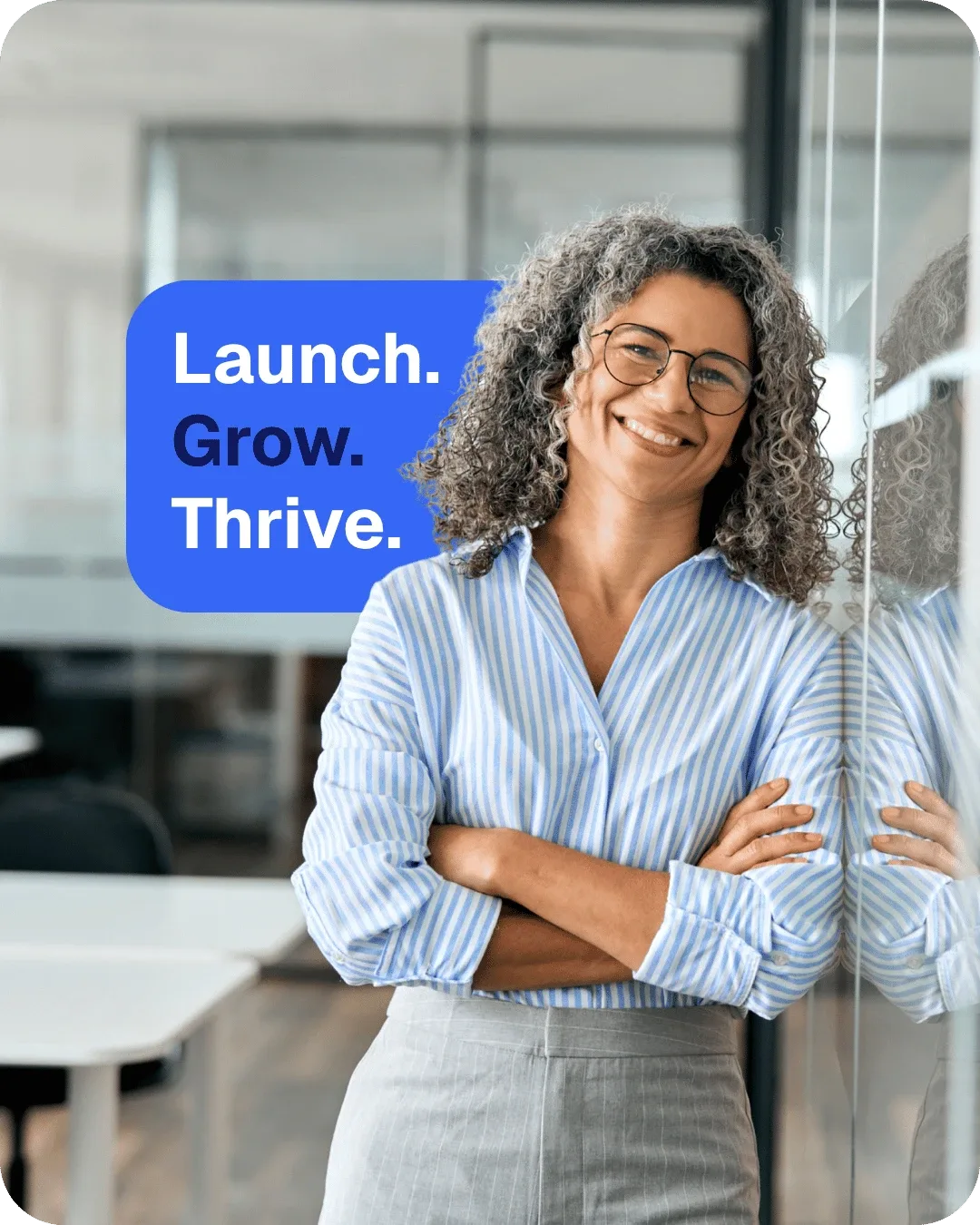 A smiling business owner with her arms crossed, beside the words Launch. Grow. Thrive.